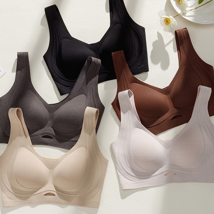 Női varrás nélküli melltartó, 3/4 kosár, formázott kosár: felső része vékony, alsó része vastag, rögzített vállpántok, fő anyag pamut, bélés pamut