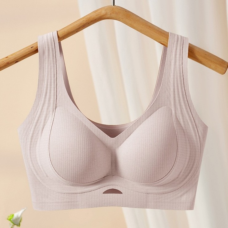 Női varrás nélküli melltartó, 3/4 kosár, formázott kosár: felső része vékony, alsó része vastag, rögzített vállpántok, fő anyag pamut, bélés pamut