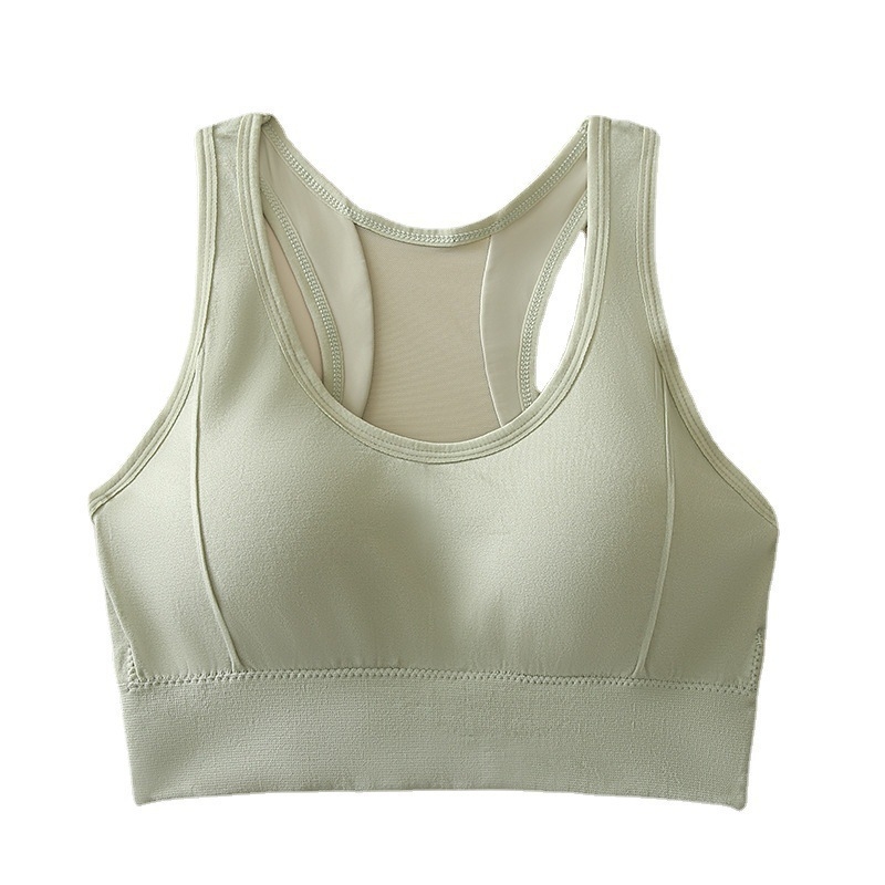 Sieviešu sporta topiņš, bezšuvju un neredzamu dizainu, ar pilnu krūšu kausu; forma ar plānu augšējo daļu un biezāku apakšdaļu; materiāls neilons 80–90%