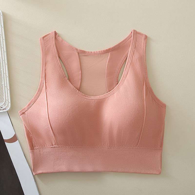 Sieviešu sporta topiņš, bezšuvju un neredzamu dizainu, ar pilnu krūšu kausu; forma ar plānu augšējo daļu un biezāku apakšdaļu; materiāls neilons 80–90%