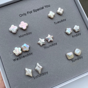 925 hõbedast kõrvarõngad looduslike mageveepärlitega, motiivid: täht, neljalehe klaver, ploomiõied, barokk helmikesed, käsitöö