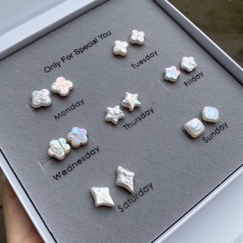 925 hõbedast kõrvarõngad looduslike mageveepärlitega, motiivid: täht, neljalehe klaver, ploomiõied, barokk helmikesed, käsitöö