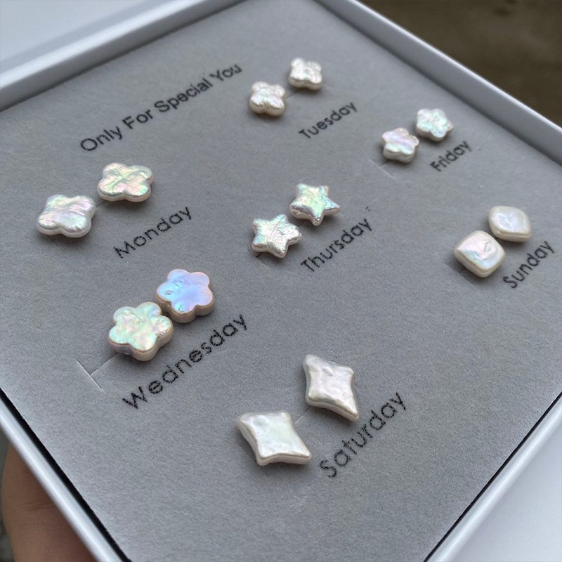 925 hõbedast kõrvarõngad looduslike mageveepärlitega, motiivid: täht, neljalehe klaver, ploomiõied, barokk helmikesed, käsitöö