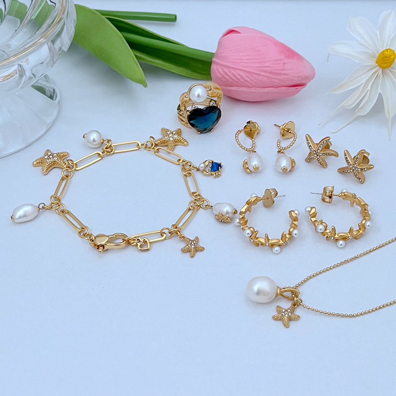 Ženski set nakita: morski motiv s rhinestones, metalni elementi, ogrlica s lancem od perlica, naušnice, prsten i narukvica
