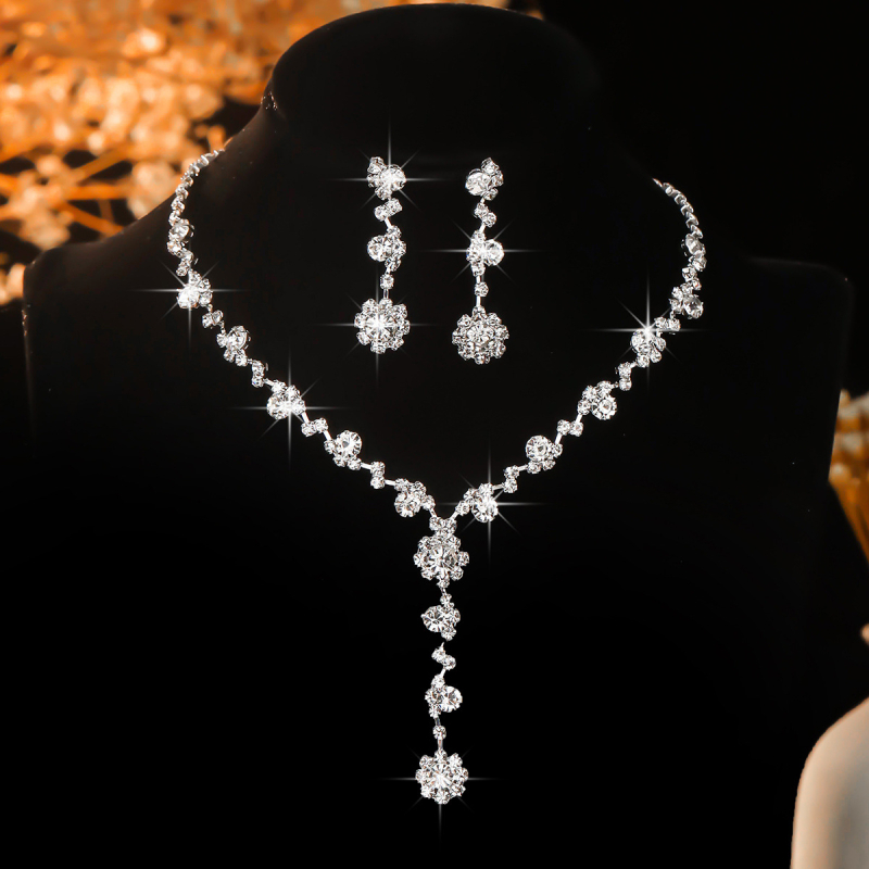 Vjenčani set nakita: ogrlica i naušnice s kristalima, korejski stil, bijeli kristali; Materijal: Kristal; Vrsta kristala: Bijeli Kristal; Privjesak: Rhinestone; Lanac: Figurativan oblik; Uzorak: Geometrijski