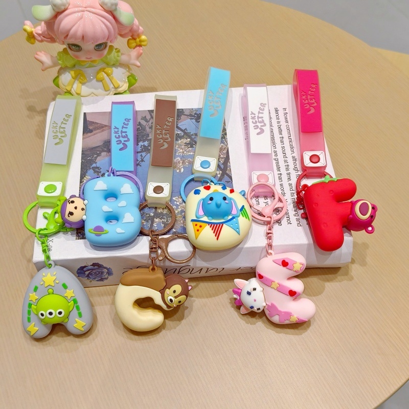 Silikonski privjesak za ključeve u karikaturalnom stilu, prilagodljiv za ruksak, poklon