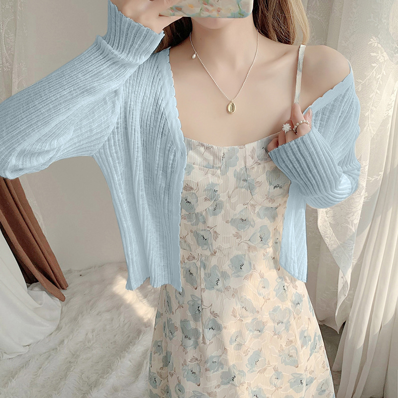 UV aizsargājošs īss kardigans sievietēm, garums 40–50 cm, viegls ice-silk adījums, garas piedurknes, vienas pogas aizdare, UPF40+, vasaras modelis.