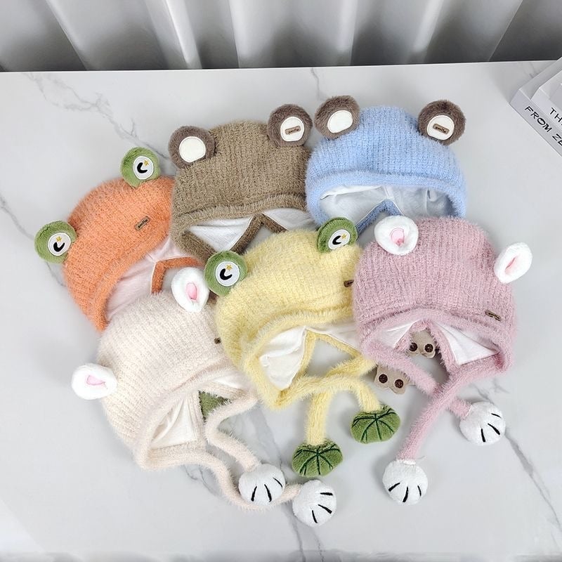 Lapsi villane müts pluüsentega kõrvakaitseiga, kupolkujuline ja lühikese visiriga; hoiab sooja ja on tuulekindel; materjal: plüüš; hooaeg: Talv 2025; vanuserühmad: 0–12 kuud, 1–2 aastat, 2–4 aastat, 4–6 aastat, 6–12 aastat.