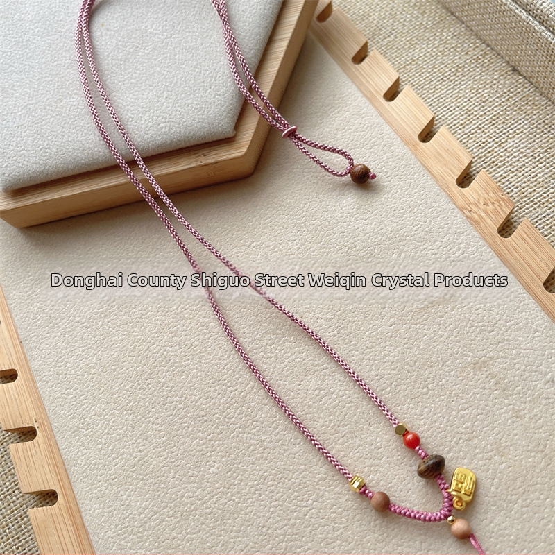 Crystal rokām adīta virvju kaklarota