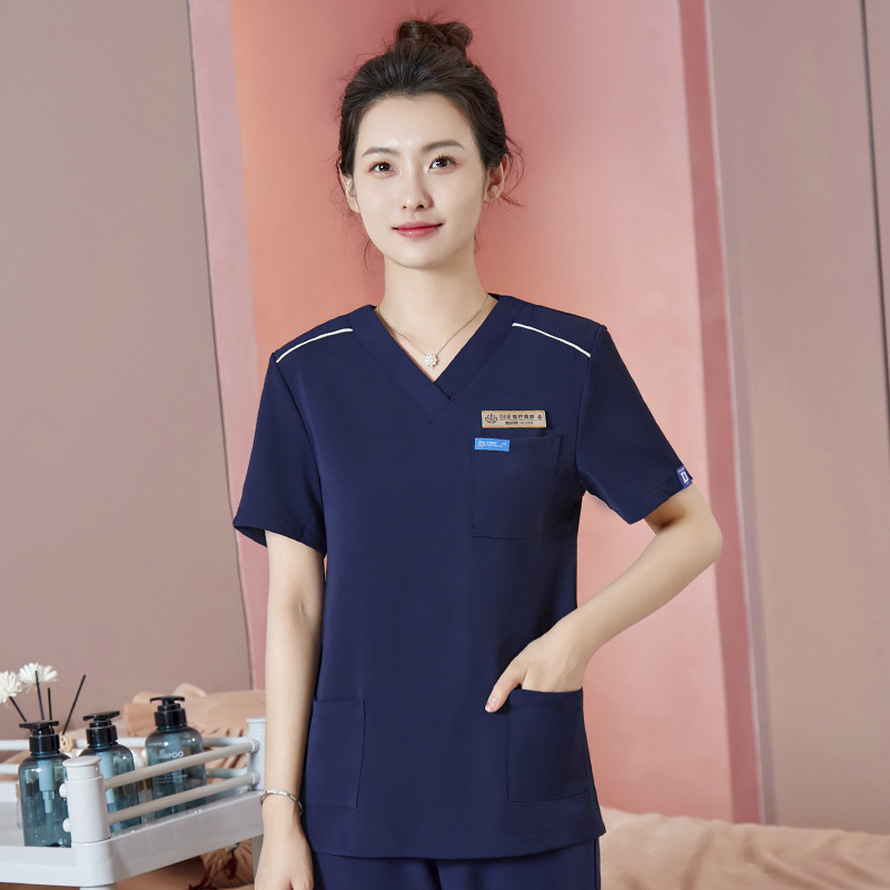 Unisex darba apģērbs skaistumkopšanas tehniķiem ar radiācijas aizsardzību, poliestera-spandeksa audums, garās piedurknes, V formas kakls