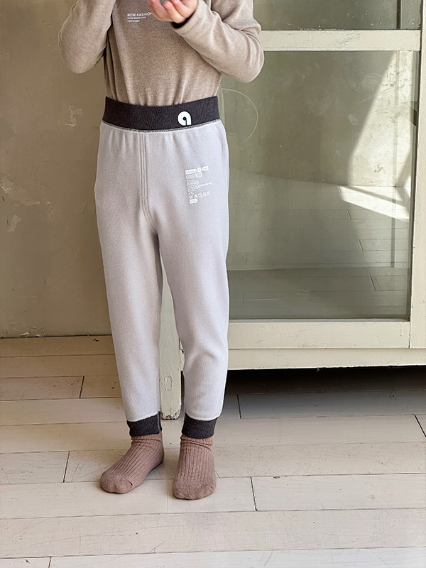 Anmiya bērnu siltas pamatbikses no Lyocell Small Milk Skin auduma, augsts viduklis vēdera atbalstam, universālas, vecums 3–8 gadi, Lyocell saturs 44,5%.