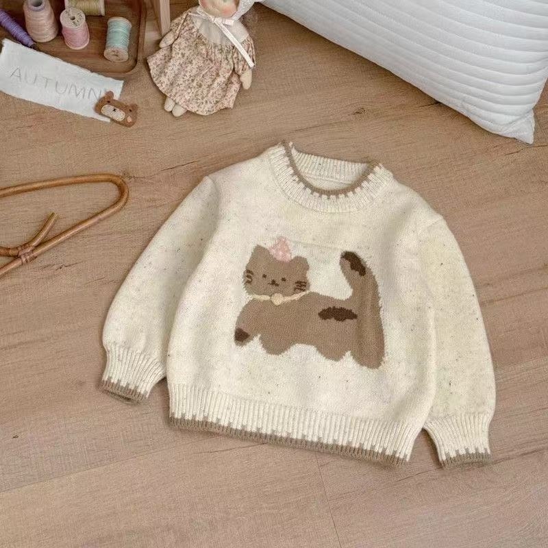 Meitenēm paredzēts adīts džemperis ar karikatūras kaķi, biezināts akrila adījums (50% akrils), apaļš kakla izgriezums, garie piedurknes, korejiešu stils, vecumam 1–3 gadiem.