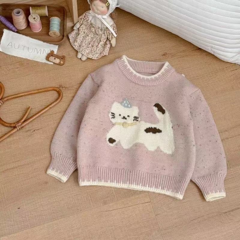 Meitenēm paredzēts adīts džemperis ar karikatūras kaķi, biezināts akrila adījums (50% akrils), apaļš kakla izgriezums, garie piedurknes, korejiešu stils, vecumam 1–3 gadiem.