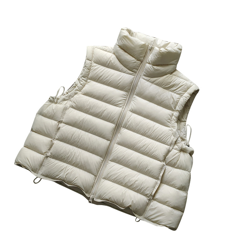 Sievietes pūka veste no neilona, pildījums gušču pūka, pūka saturs 86–90%, brīvs griezums, rāvējslēdzējs priekšā