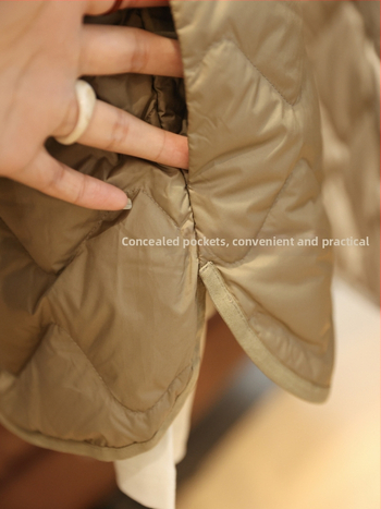 Női down kabát gyémántvarrással – könnyű nylon külső, fehér kacsa toll 86–90%, laza szabás, V-nyak, ujj nélküli, belső bélés nem levehető