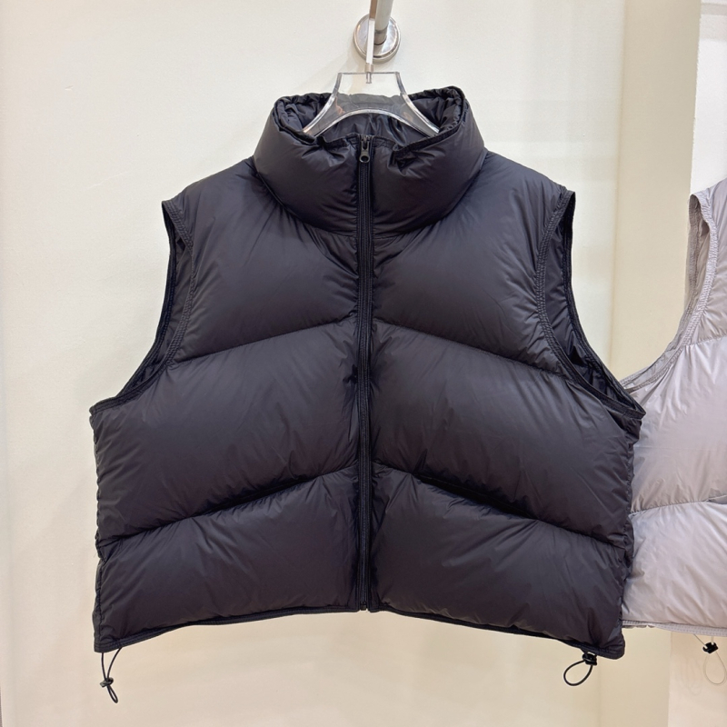 Női pehely mellény, rövid, vastag, pehely tartalom 86–90%, töltet 101–200 g, fő anyag: spandex