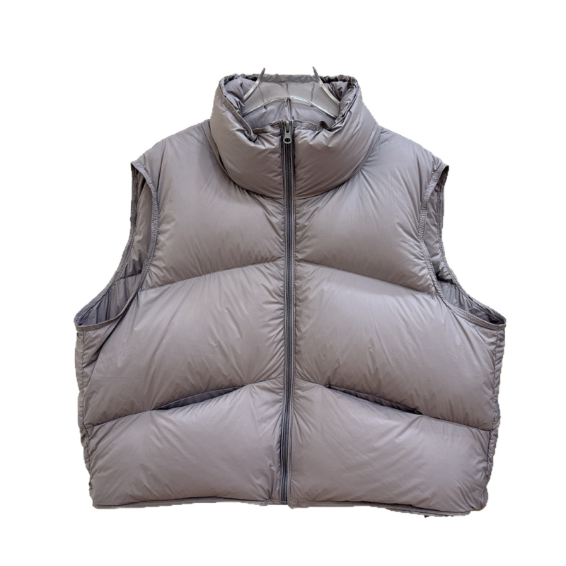 Női pehely mellény, rövid, vastag, pehely tartalom 86–90%, töltet 101–200 g, fő anyag: spandex