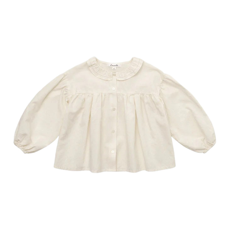 Meitenēm garām piedurknēm krekliņš no izmazgātas kokvilnas ar ziedu rakstu un apkakli, vecums 3–8 gadiem, rudens 2025 kolekcija.