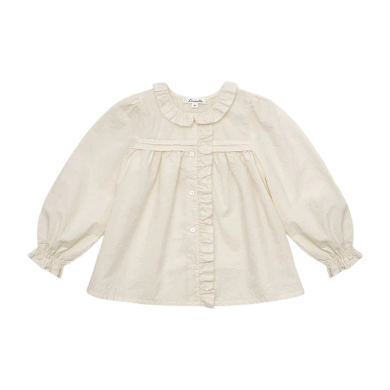 Meitenēm garām piedurknēm krekliņš no izmazgātas kokvilnas ar ziedu rakstu un apkakli, vecums 3–8 gadiem, rudens 2025 kolekcija.