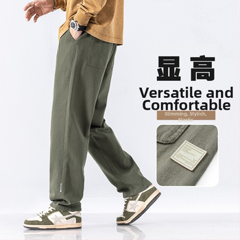 Férfiaknak szabadidős munkásnadrág koreai stílusban, lazán szabott, pamut, zsinóros zárás