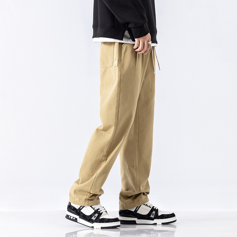 Férfiaknak szabadidős munkásnadrág koreai stílusban, lazán szabott, pamut, zsinóros zárás