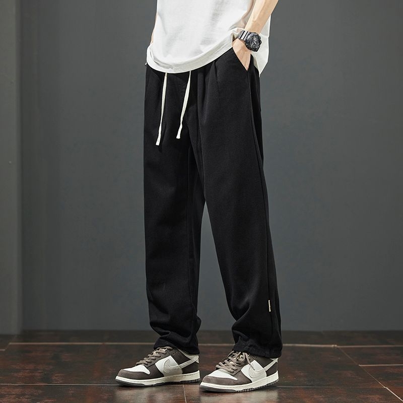 Férfiaknak szabadidős munkásnadrág koreai stílusban, lazán szabott, pamut, zsinóros zárás