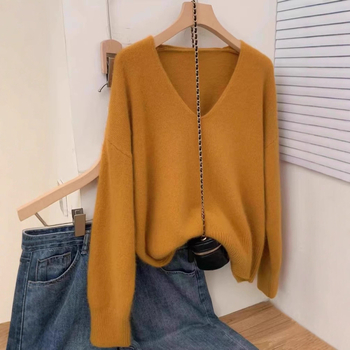 Vilnas pulovers, V kakls, garas piedurknes, parasts garums 50–65 cm, brīvs piegriezums