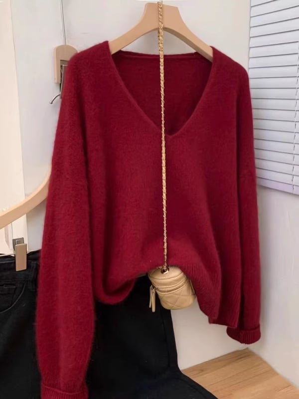 Vilnas pulovers, V kakls, garas piedurknes, parasts garums 50–65 cm, brīvs piegriezums