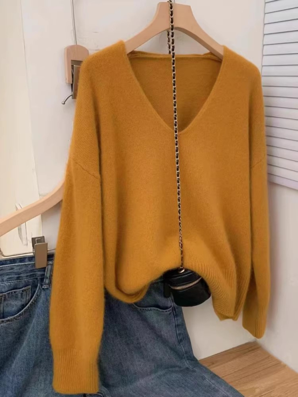 Vilnas pulovers, V kakls, garas piedurknes, parasts garums 50–65 cm, brīvs piegriezums