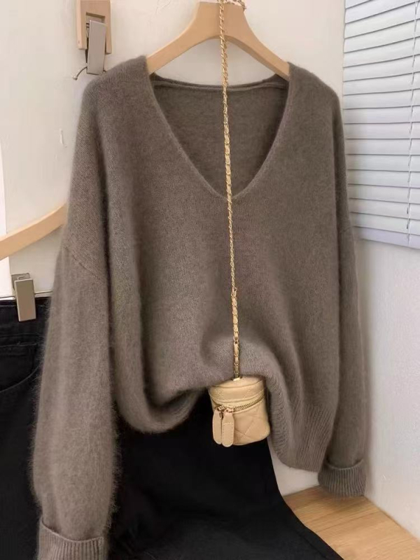 Vilnas pulovers, V kakls, garas piedurknes, parasts garums 50–65 cm, brīvs piegriezums