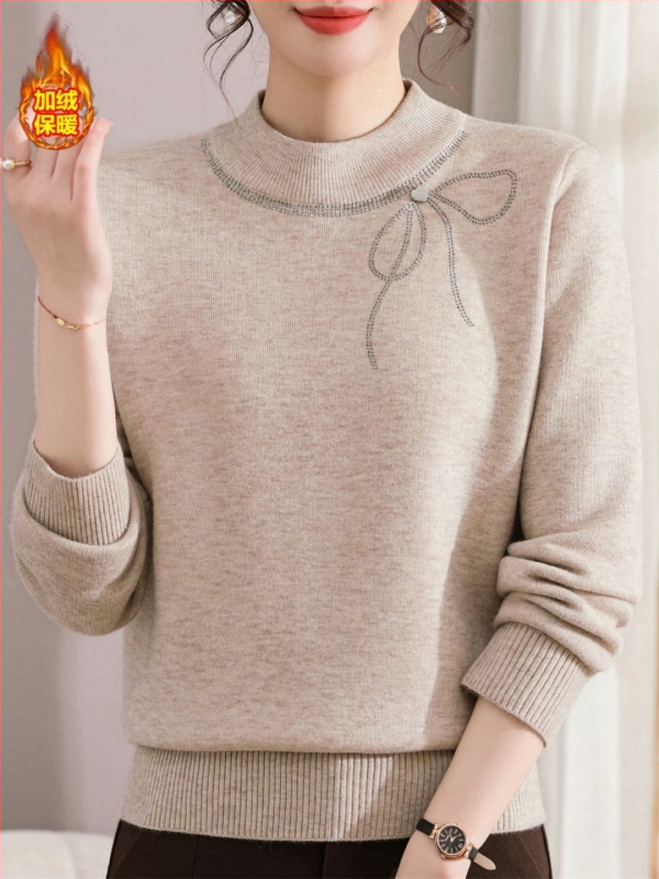 Villaseguga lõngast kootud džemper kristallidega, ümara kaelusega, vibu-muster, polüester 30–50%