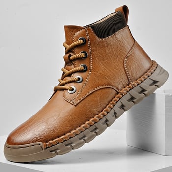 Martin saapad Goodyear kummist tallaga, pealiskate ehtsast nahast, EVA sisetald, keskmise sääre kõrgusega, ümmarguse ninaga