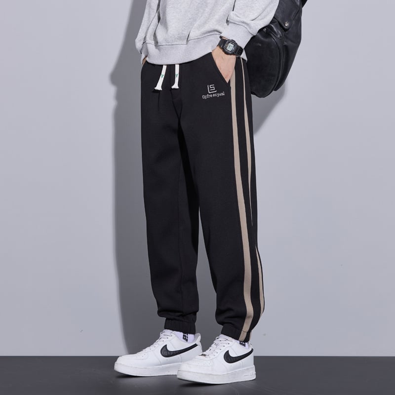 Férfi téli casual nadrág, lazán szabott, fleece-béléssel, megkötős zárás, középmagas derekú, poliészter‑keverék anyag