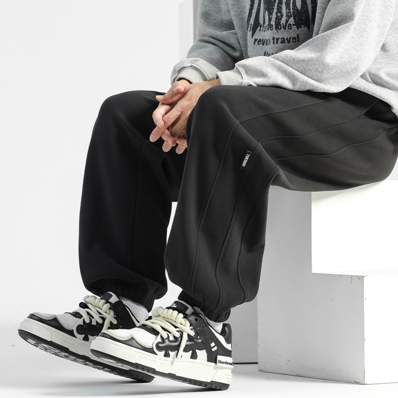 Férfi szélálló, fleece-béléssel ellátott laza sportos nadrág télre, középmagas derék kötővel