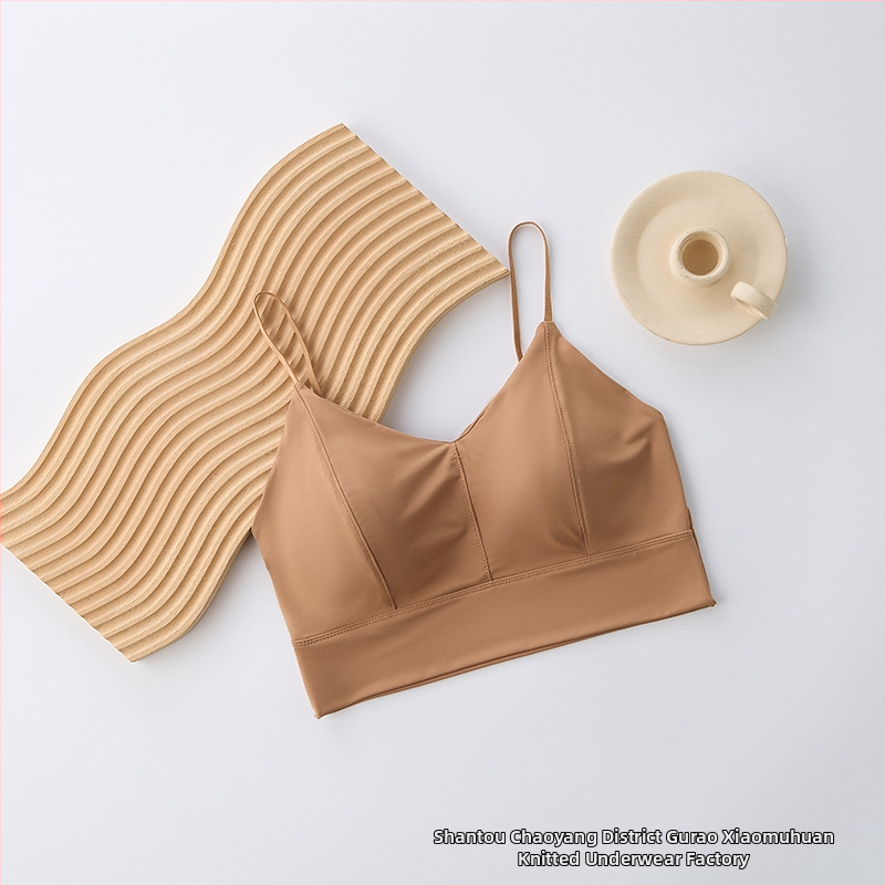 Bez plecu top no ice silk auduma, galvenais materiāls neilons 80–90%, pilns kauss, kausa forma: augšējā plāna / apakšējā bieza, korejiešu stila aizmugures dizains, elpojošs un ērts