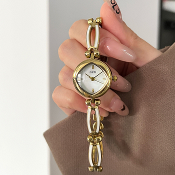 Női karkötőóra, rombusz alakú számlap, gyöngyház hatású számlap, quartz meghajtás, 30m vízállóság