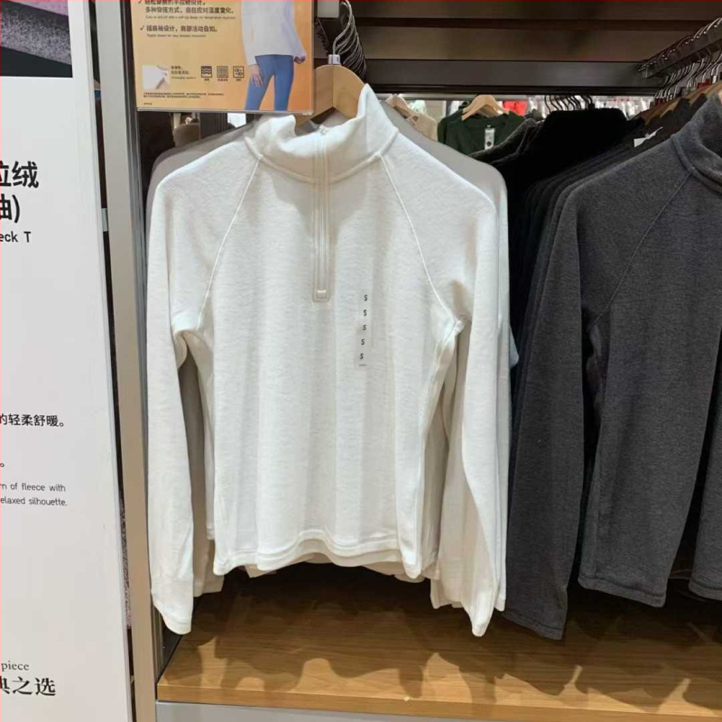 Japanski stil, elastičan flis s polu-zipom i kapuljom, dugi rukavi, uski kroj