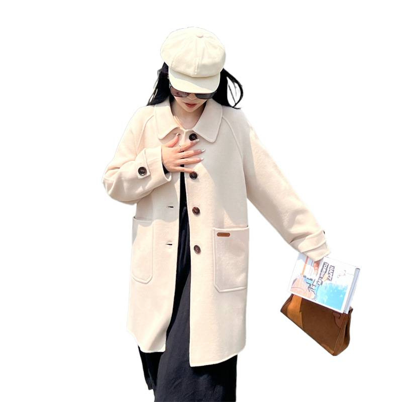 Γυναικείο διπλής όψης παλτό από μαλλί, μεσαίου μήκους, γιακά τύπου κουκλάκι, χαλαρή εφαρμογή, μανίκια 3/4.