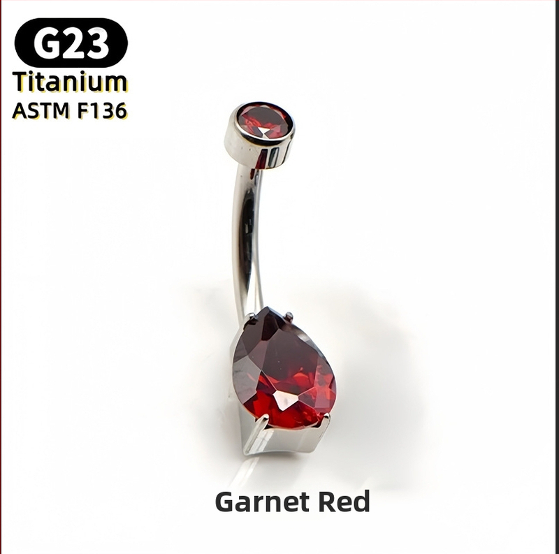 Nabelio žiedas – kriaušės formos lašas, 5A kubinis cirkonis, G23 titanas (ASTM F136), poliruotas