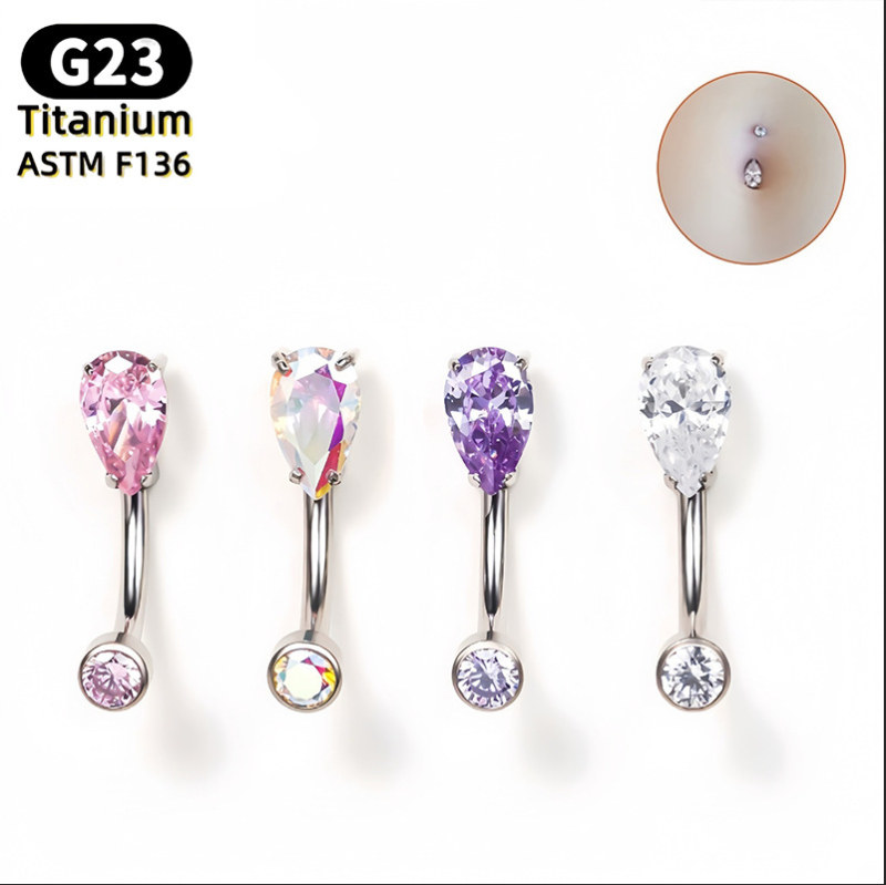 Nabelio žiedas – kriaušės formos lašas, 5A kubinis cirkonis, G23 titanas (ASTM F136), poliruotas