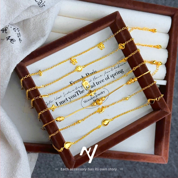 Sievietes vara potītes aproce ar etnisko stilu un burtiem krellēm.