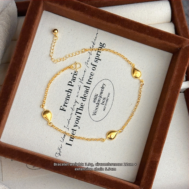 Sievietes vara potītes aproce ar etnisko stilu un burtiem krellēm.