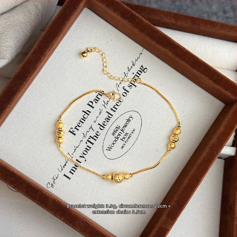 Sievietes vara potītes aproce ar etnisko stilu un burtiem krellēm.