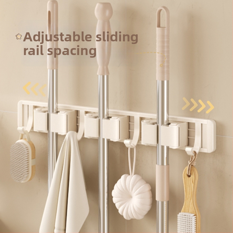 Držiak Crown Toon na mop a metlu, materiál: vesmírny hliník a plast, montáž bez vŕtania, úschova rúčky na metlu, povrchová úprava sprej plast, hmotnosť 0,3 kg