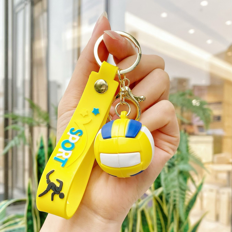 Kljucni lanac sa sportskim motivom Svjetskog prvenstva – crtani stil, mekani PVC materijal, privjesak lopta