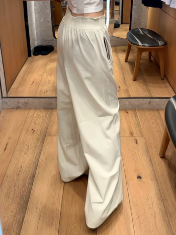 Sieviešu plašās sporta bikses skrējējiem ar ruļveidīgu elastīgo jostu, vidēji augstu jostas vietu, neilona audums, mitruma vadība