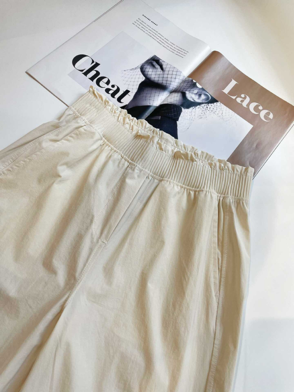 Sieviešu plašās sporta bikses skrējējiem ar ruļveidīgu elastīgo jostu, vidēji augstu jostas vietu, neilona audums, mitruma vadība