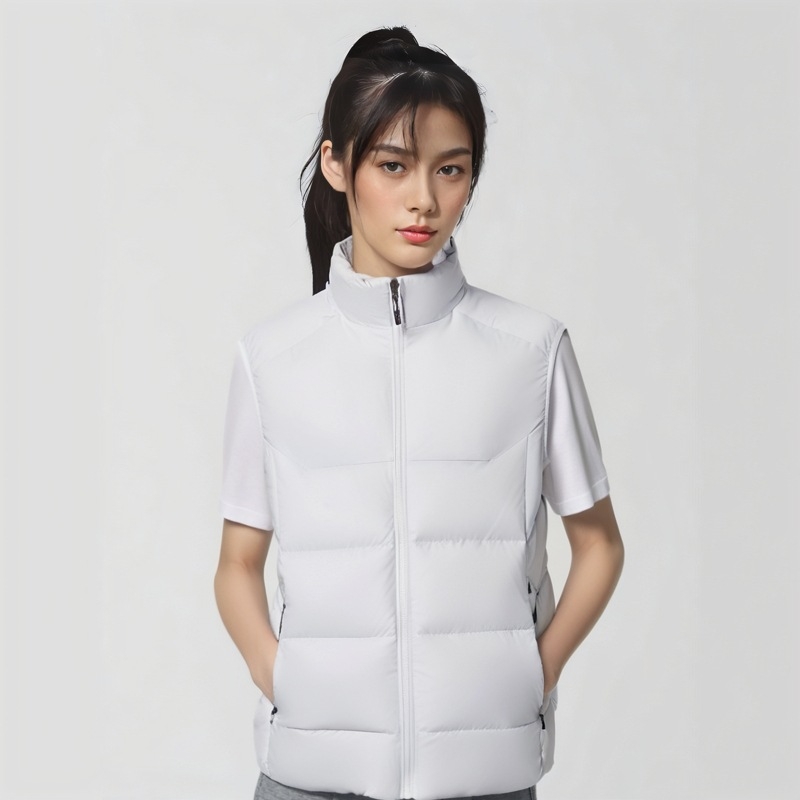 Sporta veste ar universālo, silta ar dūnas-pamatu pildījumu, stāvoša apkakle; piemērota pie sportam, piemēram, cīņas mākslai, skrējienam un velosipēdam; audums: ķīmisko šķiedru maisījums; oderējums: 100% poliesteris; sezonas: ziema, pavasaris, rudens