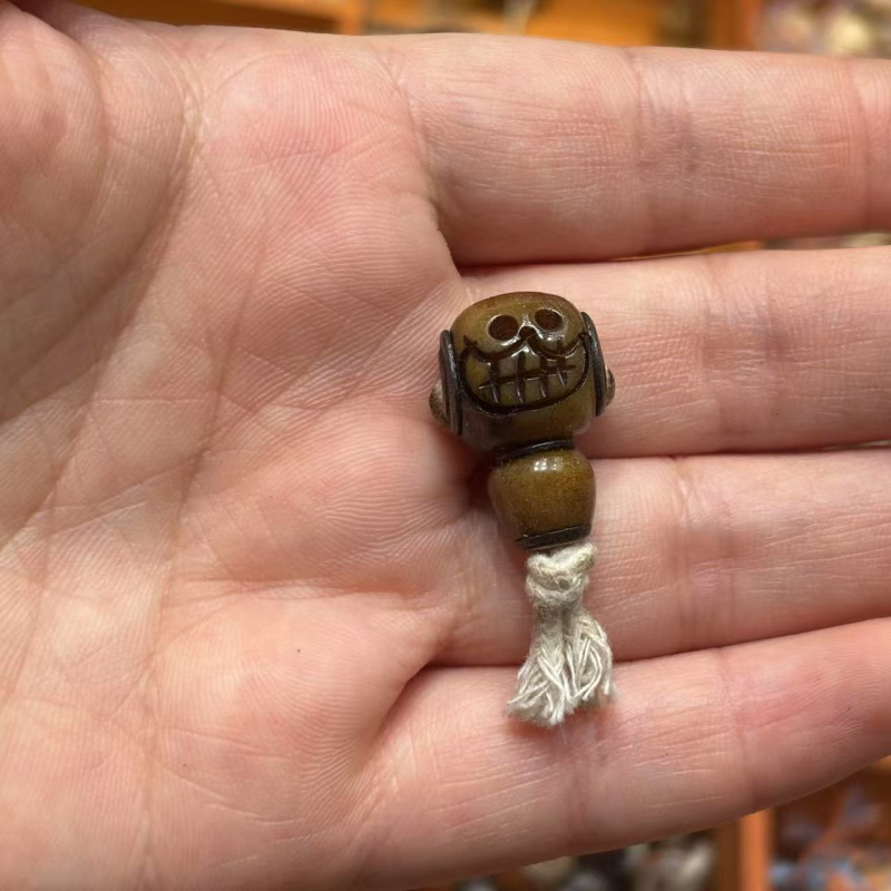 Buda Kostna glava u stilu Xizang s ugrađenim rezbarijama, polirana, Guangzhou, proljeće 2025, kod 324534