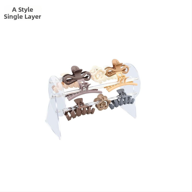 Akrilo juvelyrinių aksesuarų ekspozicijos stendas, skaidrus, vieno aukšto, sujungimo konstrukcija, mergaitiško stiliaus, palaiko etikečių žymėjimą